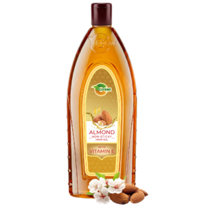 COSMI Almond Non-Sticky Hair Oil with Vitamin E bottle, displayed next to fresh almonds and white almond blossoms.