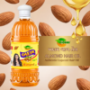 COSMI Authentic Gujarati Almond Hair Oil | Deep Nourishment Authentic Gujarati COSMI Almond Hair Oil bottle surrounded by floating almonds and golden oil drops.